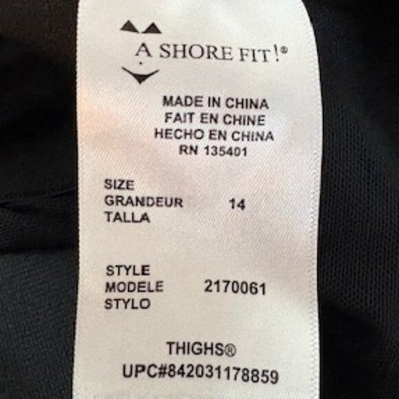 A Shore Fit Black and White One-Piece Bathing Suit Dress with Adjustable Straps - Picture 6 of 7